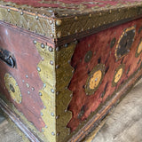 trunk embellished with Spanish coins