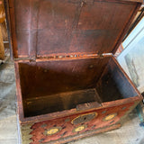 trunk embellished with Spanish coins