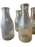 8 Vintage Glass Milk Bottles in Metal Carrier