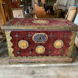 trunk embellished with Spanish coins