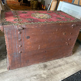 trunk embellished with Spanish coins