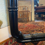 Black faux bamboo framed mirror