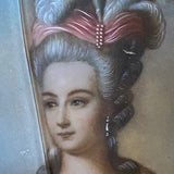 small portrait painting in bronze frame with Bow