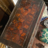 Small tabletop chest of drawers with inlay pattern