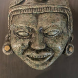 green stone face art
