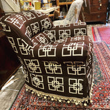 Brown and white club chair