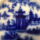 flo blue small plate withpagoda on it