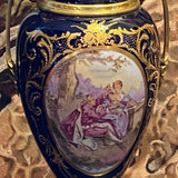 Pair of Cobalt Blue Sevres Urns with Tops and Metal Mounts