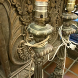 pair of bronze colored lamps