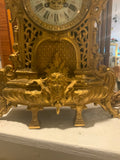 gilded garniture set clock and two candleabras