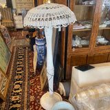 white wicker floor lamp