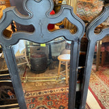 pair of black framed mirrors