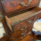 Small tabletop chest of drawers with inlay pattern