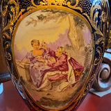 Pair of Cobalt Blue Sevres Urns with Tops and Metal Mounts