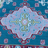 green and red kilim rug