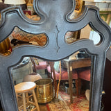 pair of black framed mirrors