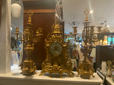 gilded garniture set clock and two candleabras