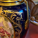 Pair of Cobalt Blue Sevres Urns with Tops and Metal Mounts