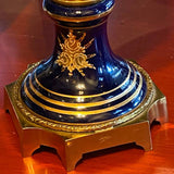 Pair of Cobalt Blue Sevres Urns with Tops and Metal Mounts
