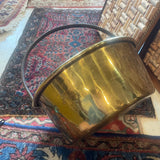 brass pot with iron handle