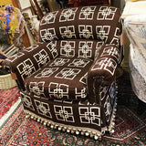 Brown and white club chair
