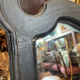 pair of black framed mirrors