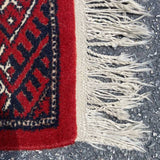 Traditional Red Rug Bokara with Fringe Detail