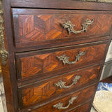 Small tabletop chest of drawers with inlay pattern