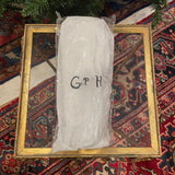 GP white slippers with GPH initials in black