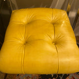 pair of chrome and yellow counter stools