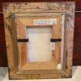 Painting of an orange in gold frame