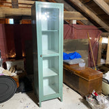 Tall green glass front cabinet