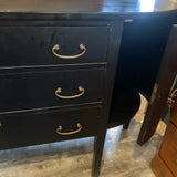 Black bowfront sideboard with three drawers and two side curved doors