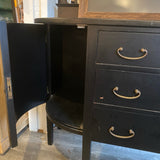 Black bowfront sideboard with three drawers and two side curved doors