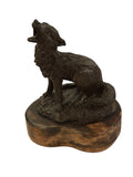 Bronze coyote sculpture on wood base signed Lowell Davis