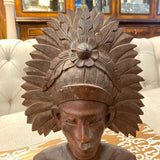 Balinese carved wood male and female busts with headress