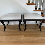 pair of ottamans by Oli with hide upholstery