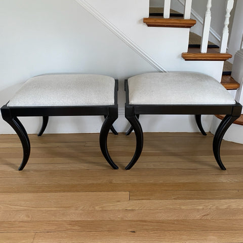 pair of ottamans by Oli with hide upholstery