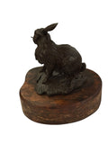 Bronze rabbit sculpture on wood base signed Lowell Davis