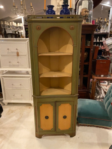 green and yellow corner cabinet