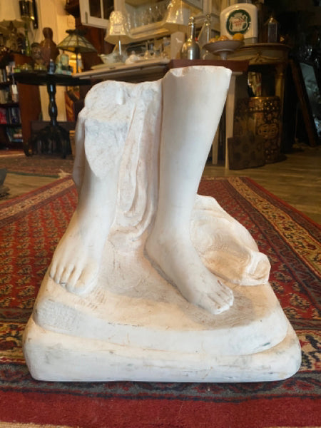 alabaster sculpture of feet