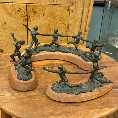 Nine Bronze Dancers By Sue Eisenberg