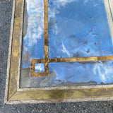 Neoclassic style  distressed mirrored coffee table with brass inlay