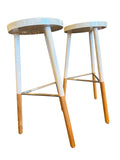 set of 4 white and light wood bar stools