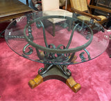 scrolled iron based glass top table