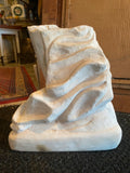 alabaster sculpture of feet