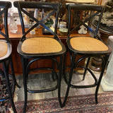 set of 4 black bar stools with woven seats