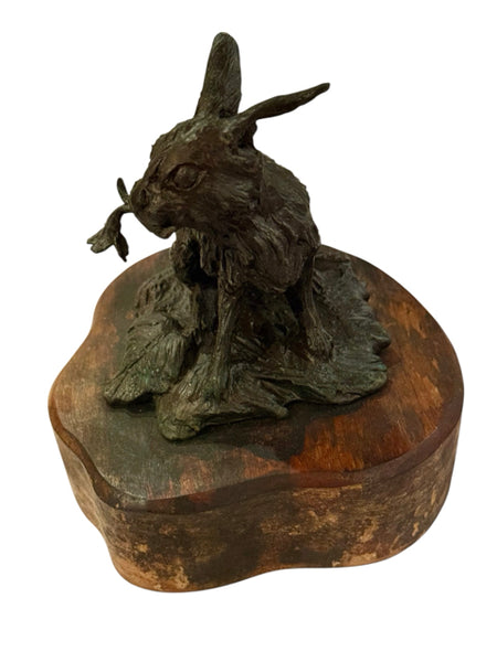 Bronze rabbit sculpture on wood base signed Lowell Davis