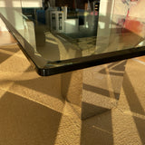 Roche Bobois glass top dining table with metal double pedestal base