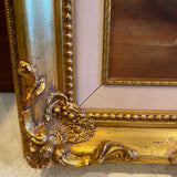 Painting of an orange in gold frame